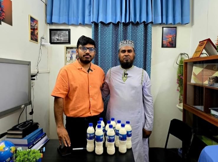 A patient bringing milk to the chamber as a gift to Dr. Khaled Hasan Milu
