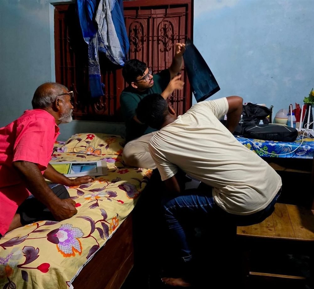 Dr. Khaled Hasan Milu giving free treatment in his village during Eid vacation